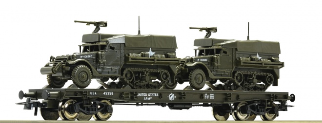 Flat car loaded with half track vehicles<br /><a href='images/pictures/Roco/Roco-76863.jpg' target='_blank'>Full size image</a>